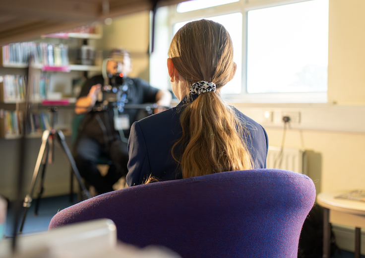 Classroom Media filming a pupil interview at a school library